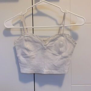 PacSun cream crop top with bust outline and lace.